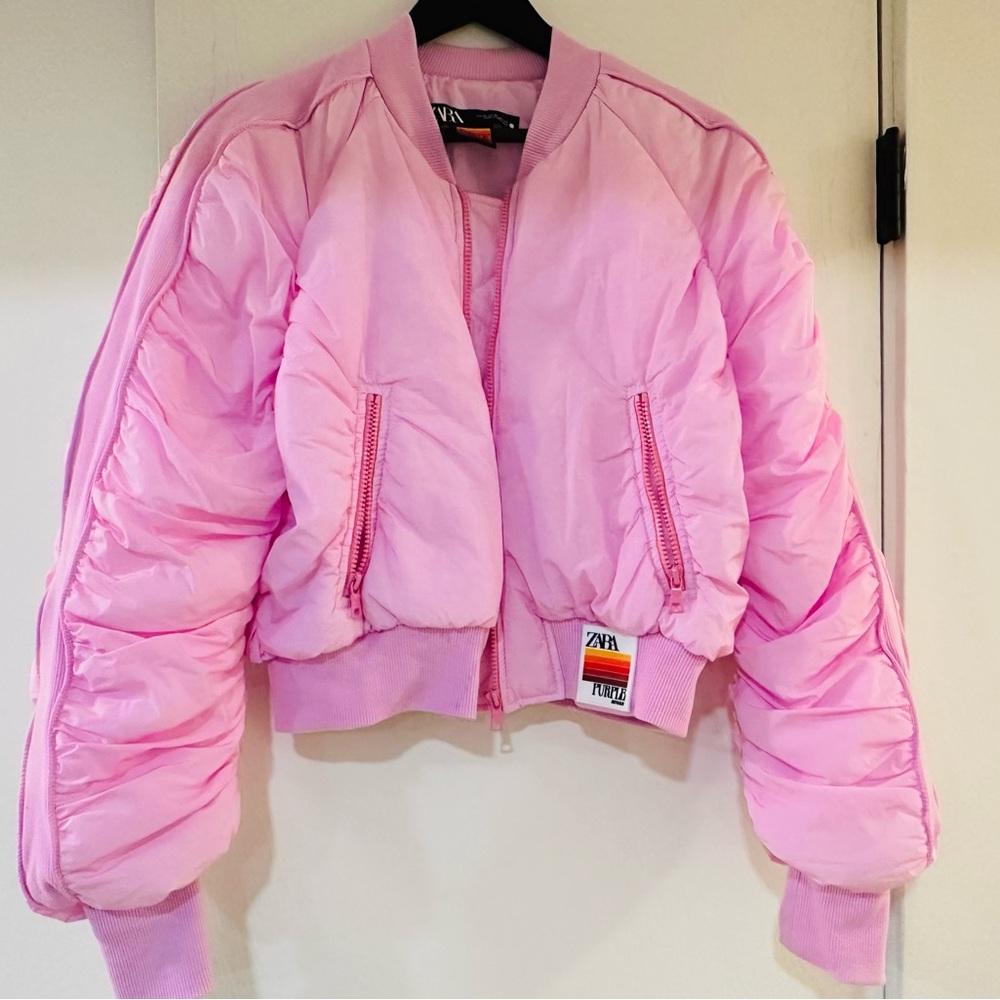 Great pink Bomber jacket by Zara special collab collection with purple magazine.